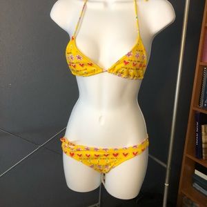 Yellow bikini with embellishments